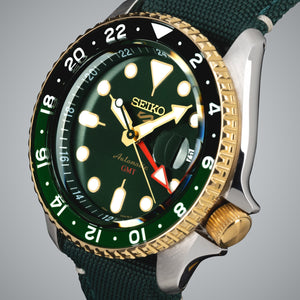 Lumibrite on hands and indices of the Seiko watch, glowing in low light conditions for enhanced readability